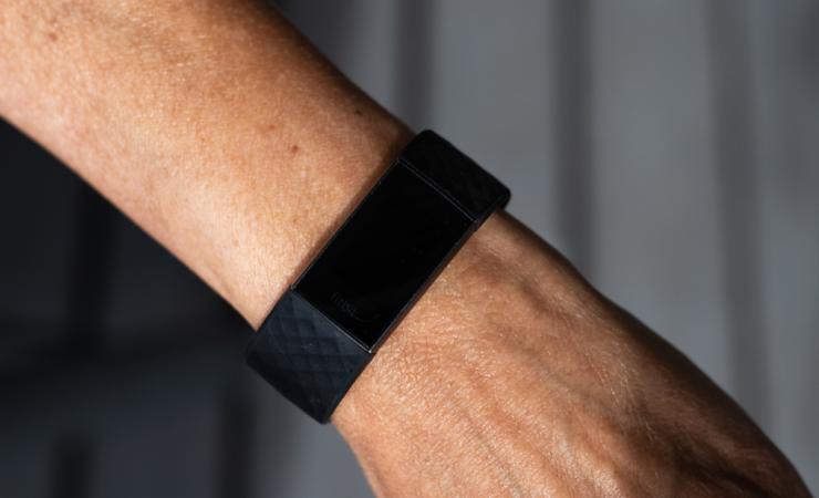 Fitbit on a bare arm. Image by Ingrid Emilie S Hansen via Shutterstock